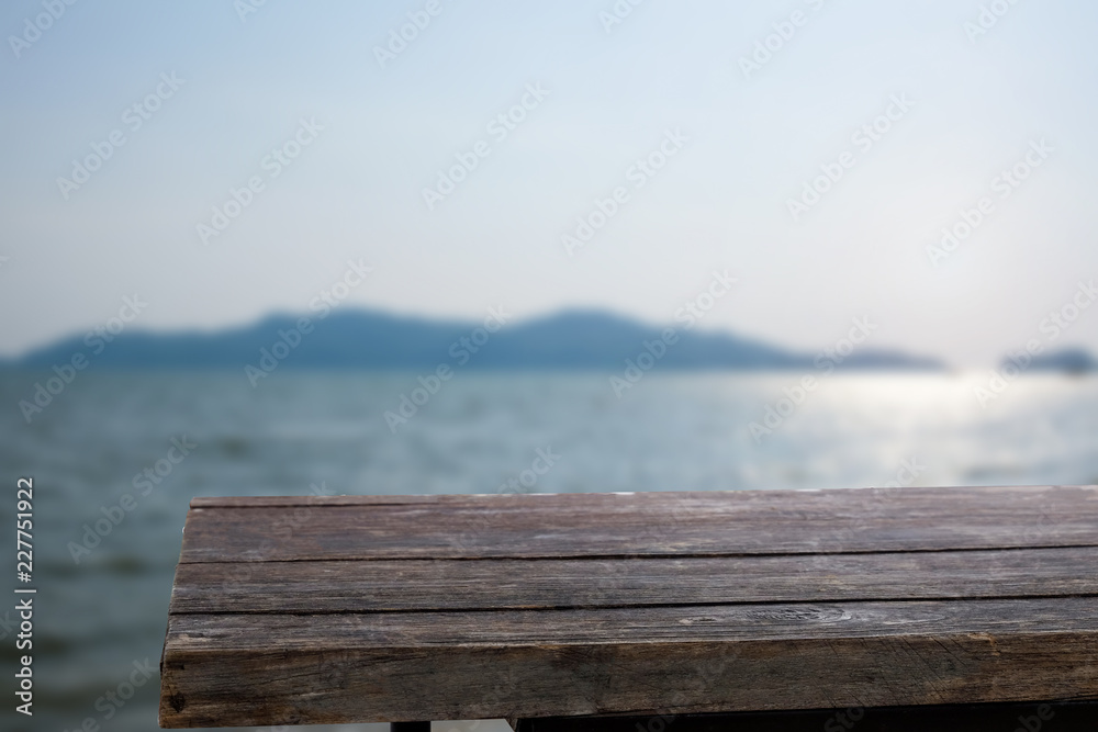 Empty table on sea background.