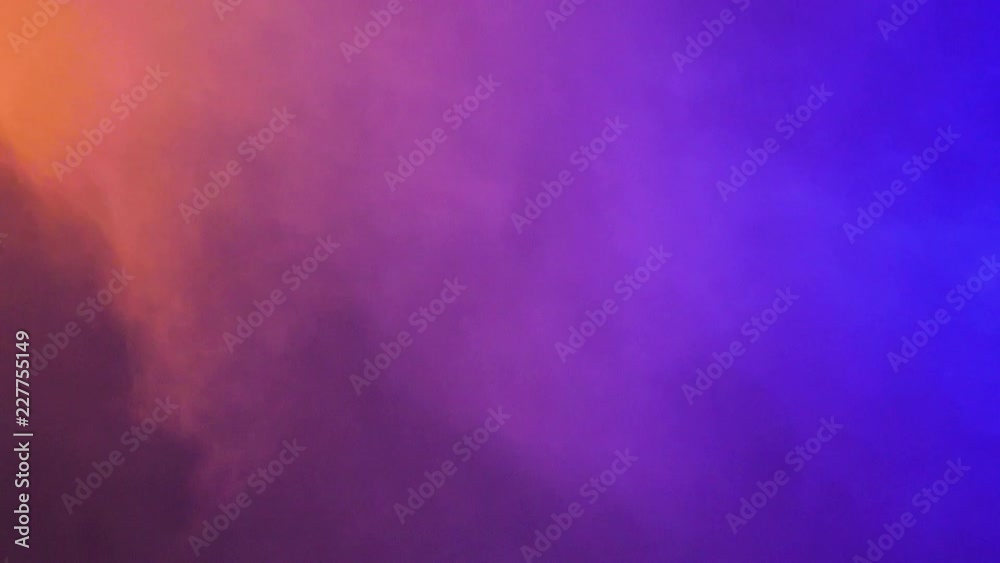 Beautiful dynamic abstract colorful smoke clouds over a black background Beautiful dynamic abstract colorful smoke clouds over a black background