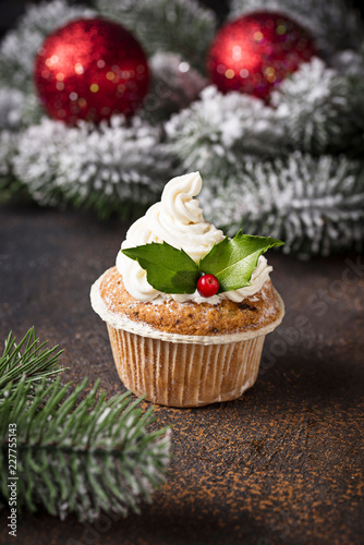 Christmas festive cupcake with holly leaves