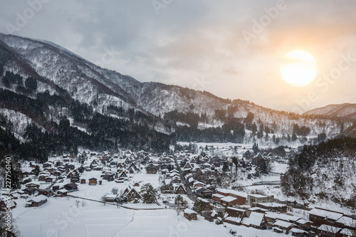 Shirakawa-go is a village famous for Gassho-zukuri (houses with steep thatched roofs) with sunset in northern Gifu prefecture, Japan