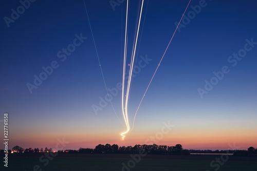 Light trails of airplane during landing