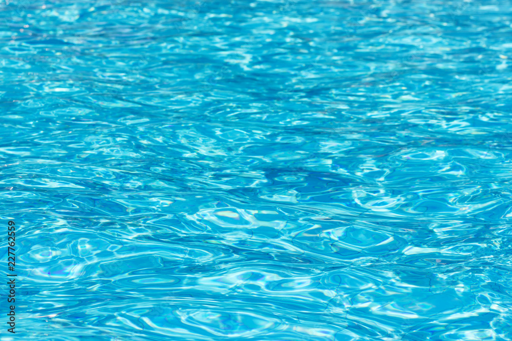 Background blue water in the pool