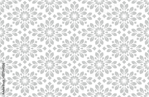 Flower geometric pattern. Seamless vector background. White and grey ornament. Ornament for fabric, wallpaper, packaging. Decorative print.
