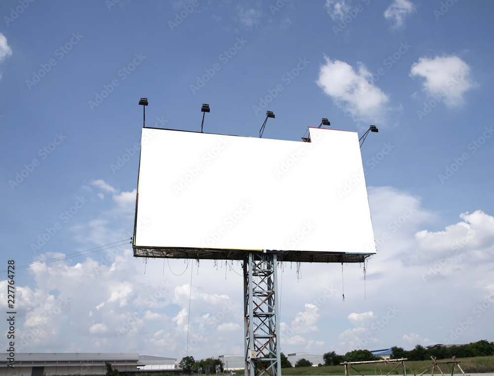 Blank billboard on blue sky background for new advertisement Blank billboard on blue sky background for new advertisement