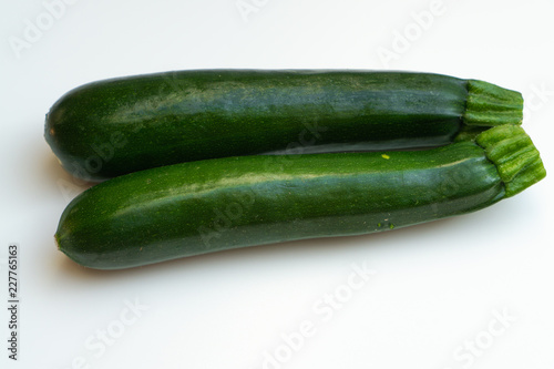 Two courgettes isolated on white