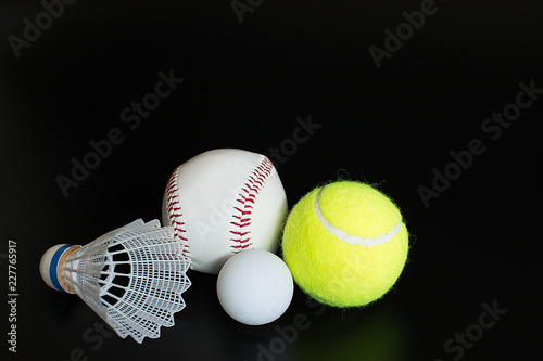shuttlecock, ping pong ball, baseball, tennis ball on black background