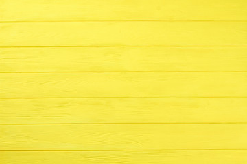 Yellow wooden boards background. Colored horizontal planks background. Natural wooden background for banner.