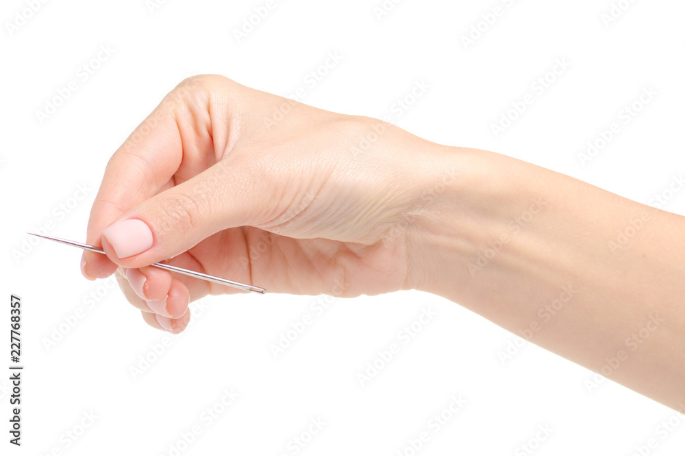 sewing needle in hand on a white background. Isolation sewing needle in hand on a white background. Isolation
