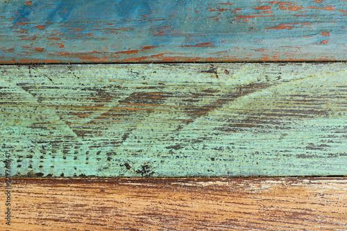 Old weathered wooden plank texture. Rustic color wooden boards backdrop. Grunge vintage wood.