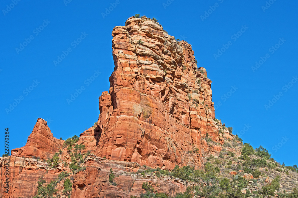 Red rock spur as seen from the Village of Oak Creek near to Sedona.