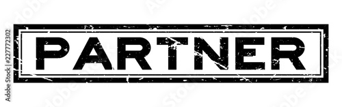 Grunge black partner word square rubber seal stamp on white background