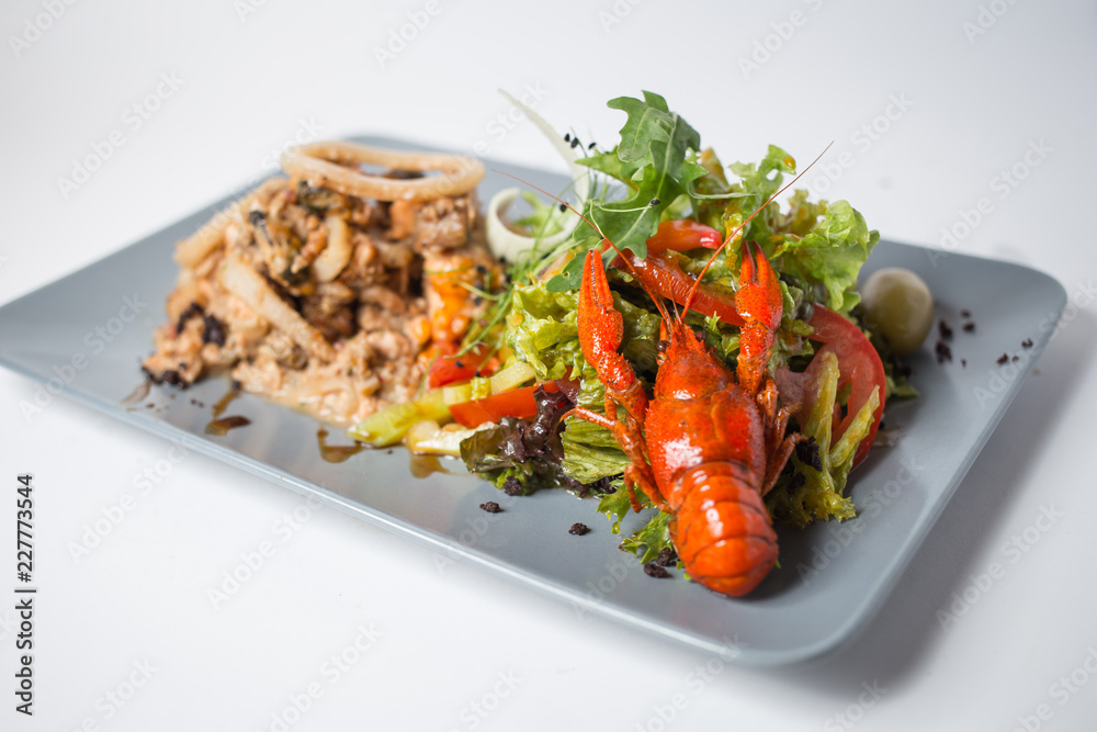 Seafood salad with squid, crayfish, mussels and green Seafood salad with squid, crayfish, mussels and green