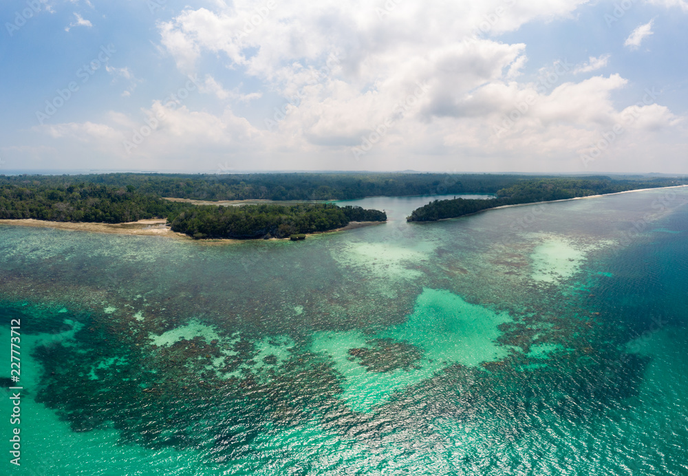 Aerial view tropical island reef. Indonesia Moluccas archipelago, Kei Islands, Banda Sea. Top travel destination, best diving snorkeling, stunning panorama.