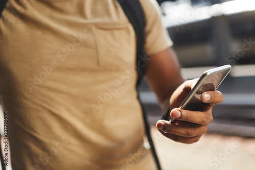 Close up of a smartphone being used by a man who is going to make a call
