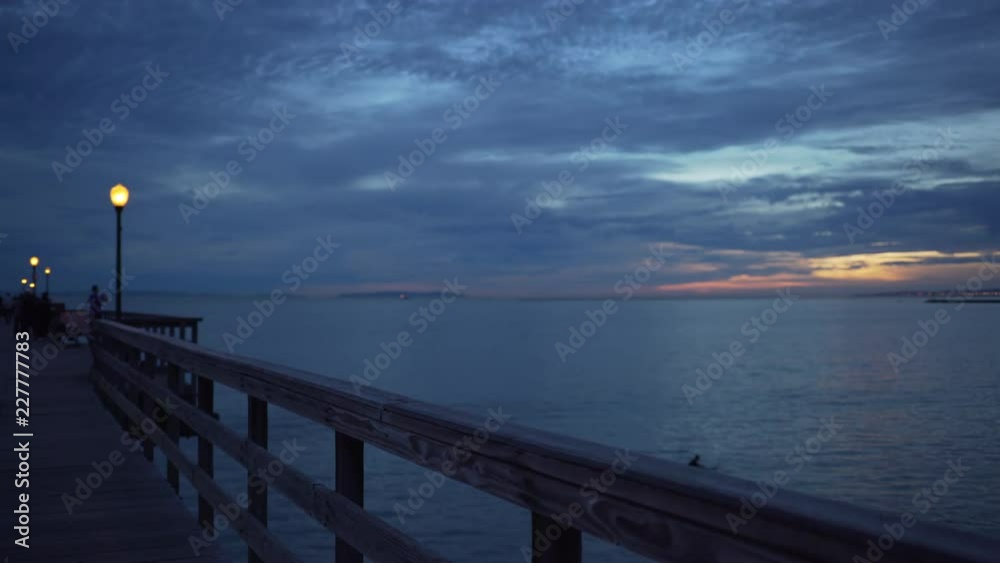 Background plate of Seal Beach pier with street lamps and picturesque sunset Background plate of Seal Beach pier with street lamps and picturesque sunset