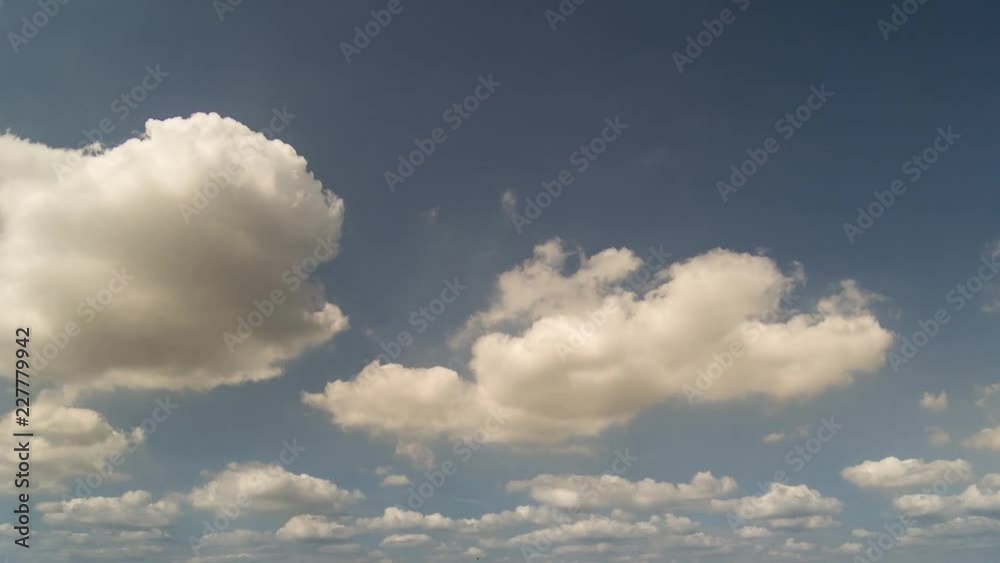 White cumulus clouds on sunny day timelapse White cumulus clouds on sunny day timelapse