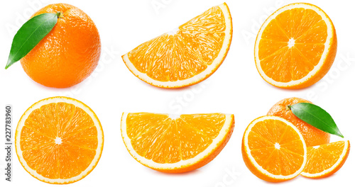 Fresh orange fruit with slices and leaf on white background