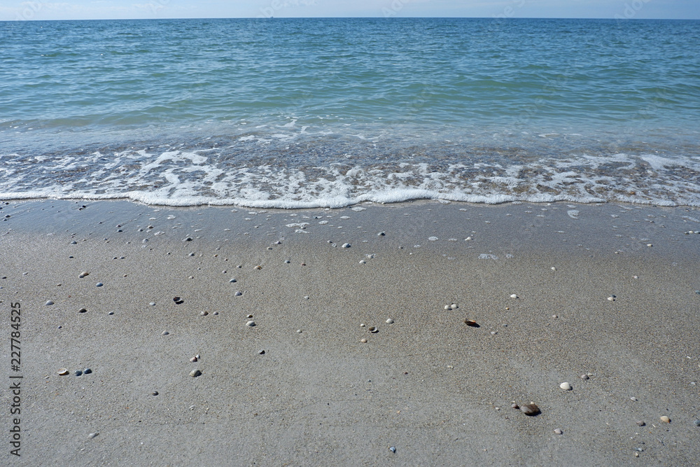 Blue sea and wet sand. Summer background Blue sea and wet sand. Summer background