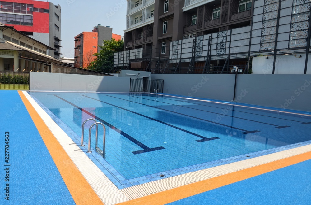 view of swimming pool on blue sky