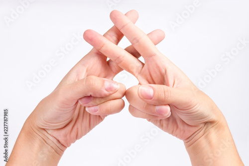 women's hands make a hashtag