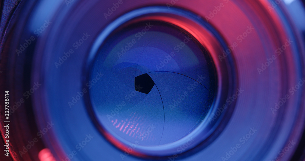 Taking photo by adjusting aperture under pink and purple light Taking photo by adjusting aperture under pink and purple light