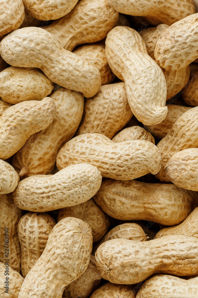 Uncleaned inshell peanuts. Peanuts, for background or textures. Uncleaned inshell peanuts. Peanuts, for background or textures.
