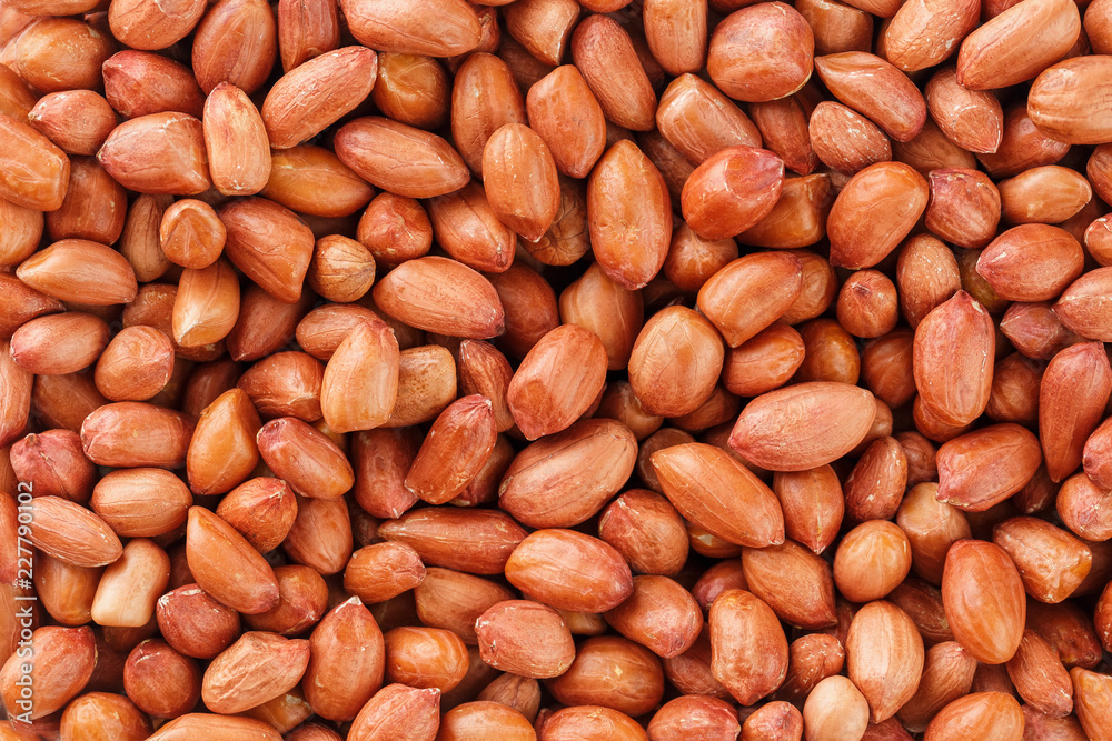 Peanuts, for background or textures. Uncleaned inshell peanuts. Peanuts, for background or textures. Uncleaned inshell peanuts.