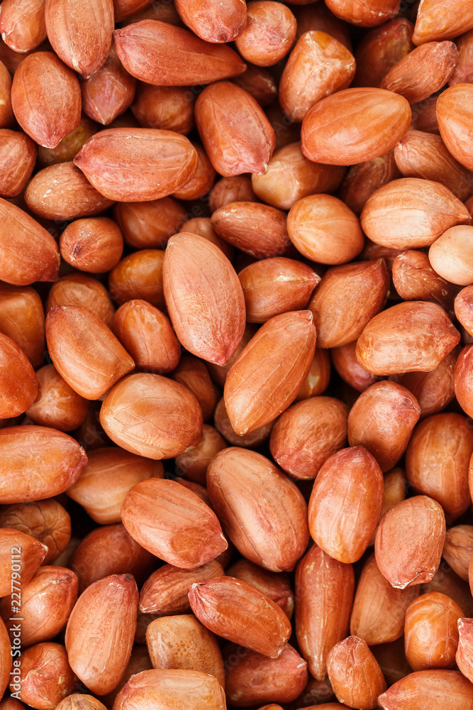 Peanuts, for background or textures. Uncleaned inshell peanuts. Peanuts, for background or textures. Uncleaned inshell peanuts.