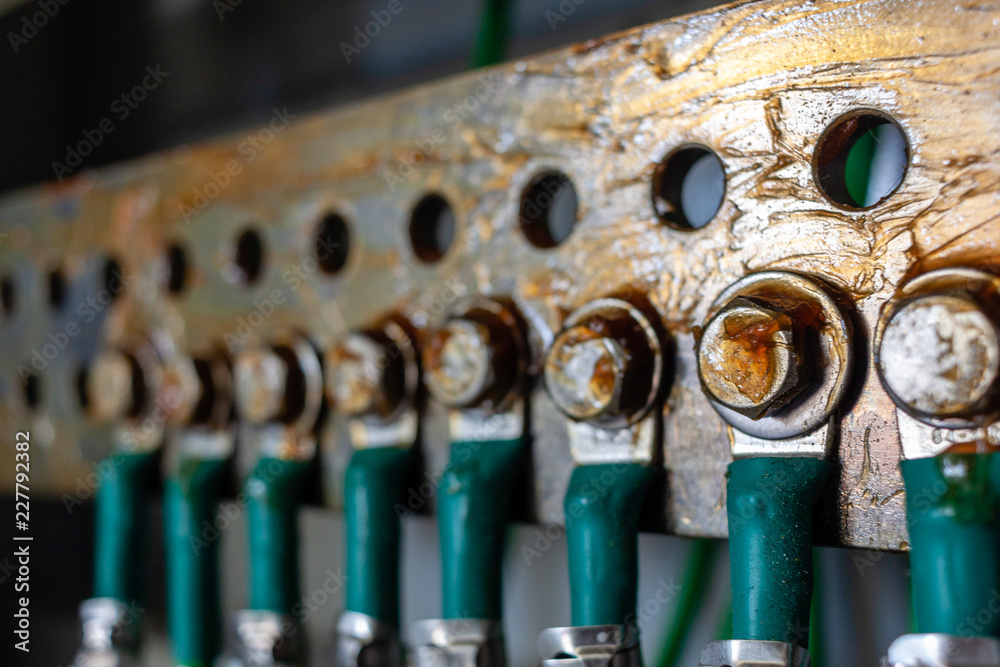 Green electrical ground wires is connected to ground copper terminal