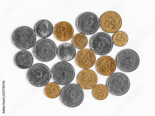 Stack of coins on a white background. Place for text.