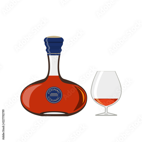 Bottle of cognac with glass isolated on white background
