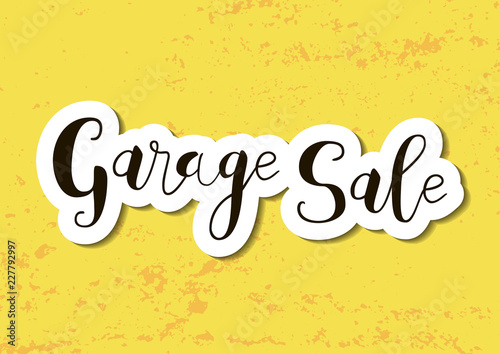 Calligraphy lettering of Garage sale in black with white outlines and shadow in paper cut style on yellow textured background for advertising, invitation, banner, poster, flyer, handbill