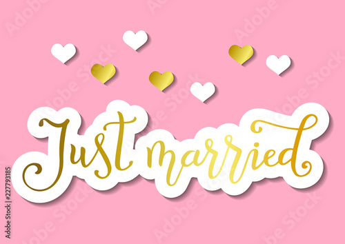 Modern handwritten calligraphy of Just married in golden in paper cut style on pink background decorated with white and golden hearts and leaves for decoration, postcard, poster, wedding, scrapbooking