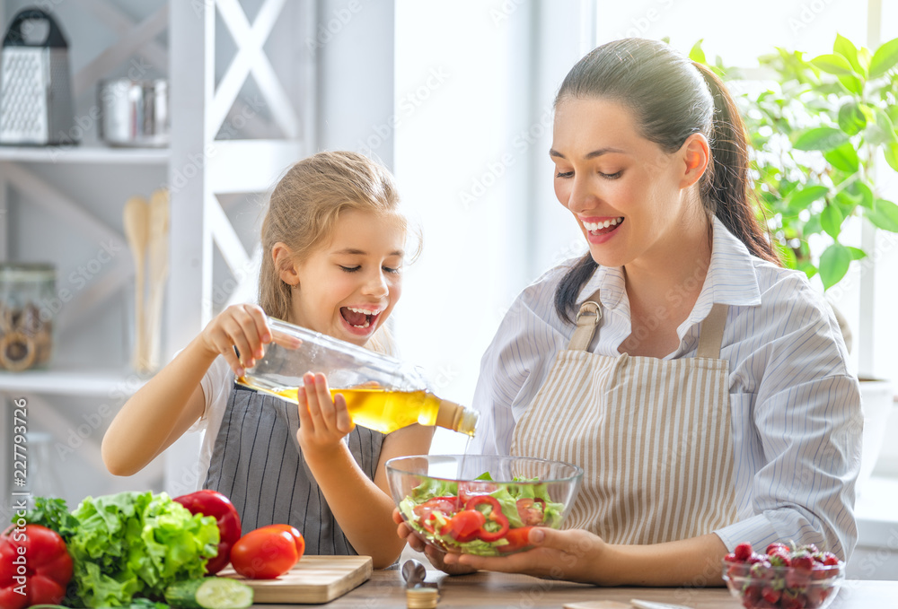 Happy family in the kitchen.