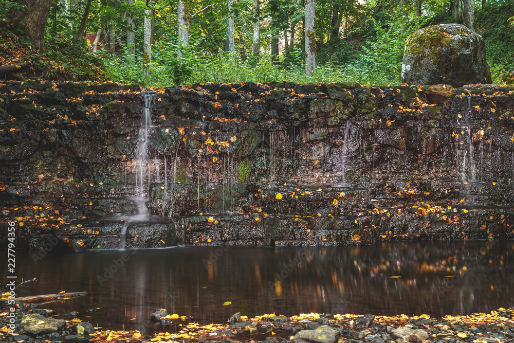 a beautiful waterfall in the fall