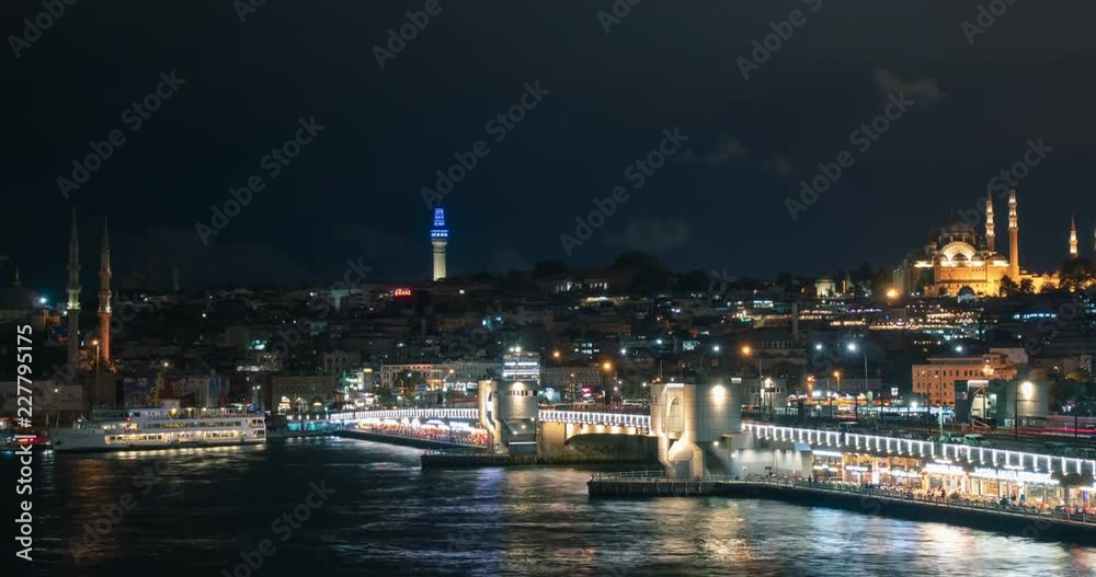 Timelapse 4k video of night Istanbul - view at the Golden Horn gulf full of ferry boats, Galata Bridge and Suleymaniye Mosque with beautiful backight Timelapse 4k video of night Istanbul - view at the Golden Horn gulf full of ferry boats, Galata Bridge and Suleymaniye Mosque with beautiful backight