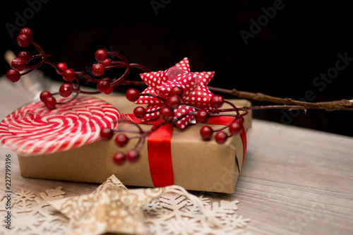 Fototapeta Naklejka Na Ścianę i Meble -  Merry Christmas and Happy Holidays!  Presents, candy with christmas ornaments.