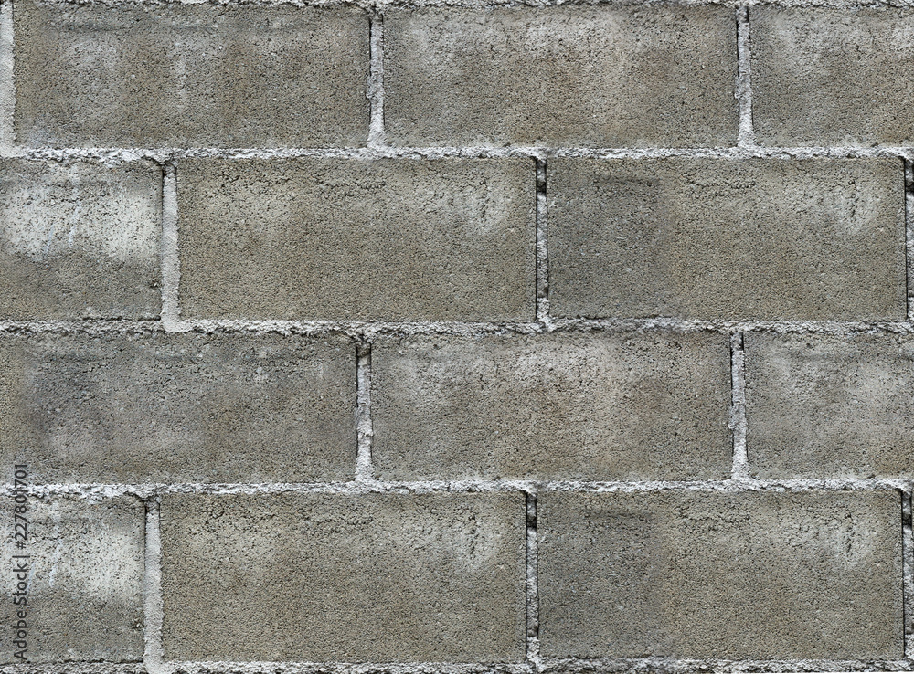 Fototapeta premium dirty weathered old cement blocks wall texture background.