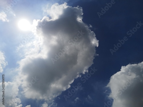 The Sun on Cloudy Sky