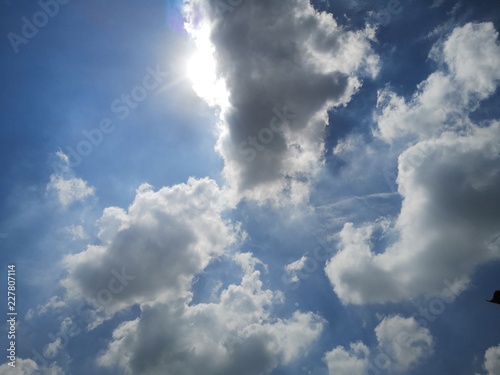 The Sun on Cloudy Sky