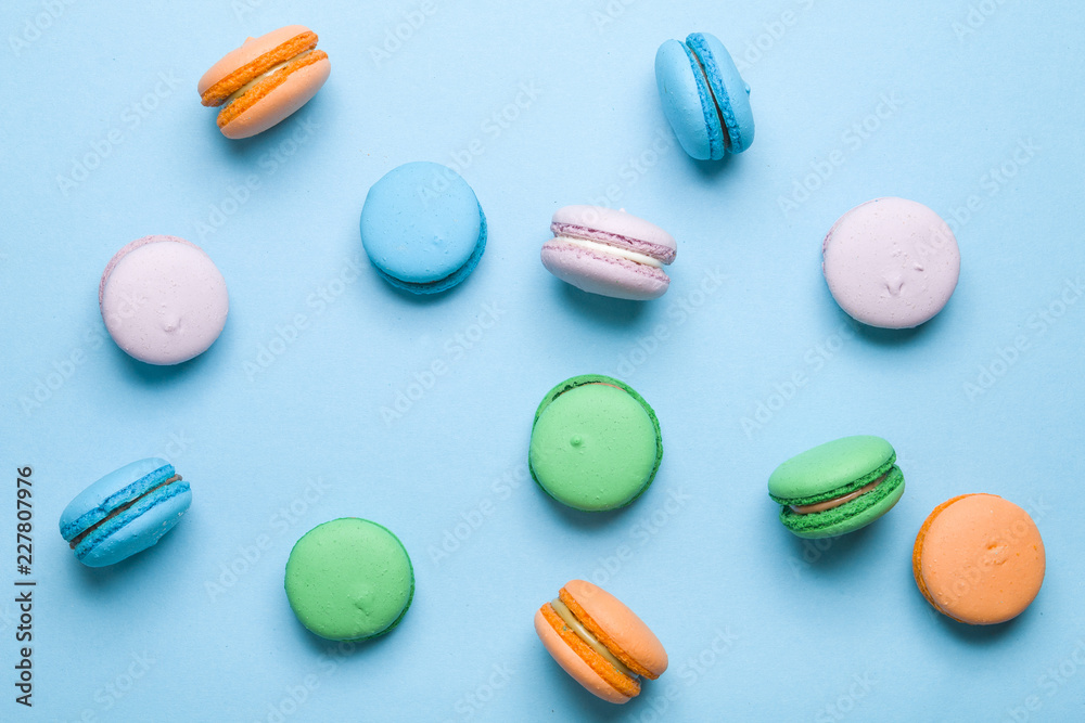 Delicious colorful cookies on a blue background Delicious colorful cookies on a blue background