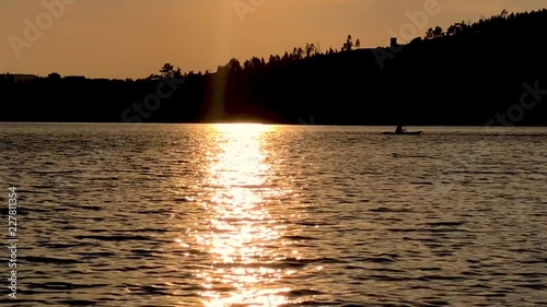 Sunset with orange tones on the river Zezere. Portugal. photo