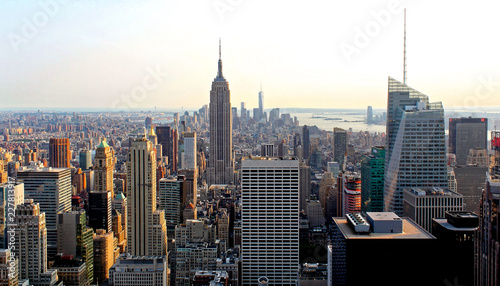 New York City  USA - August 6  2014  The Empire State Building  One World Trade Center  Times Square  and the skyline of downtown Manhattan at sunset