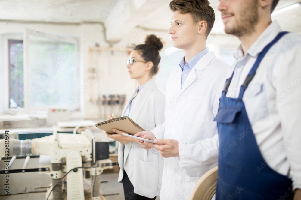 Fototapeta premium Group of students attending course for young specialists to improve their knowledge