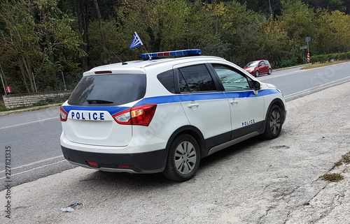 police car greek in the road