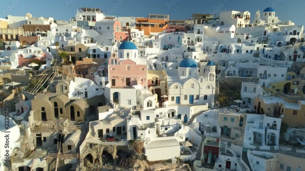 Aerial view flying over city of Oia on Santorini Greece Aerial view flying over city of Oia on Santorini Greece