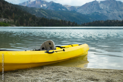 Kayak resting along lake