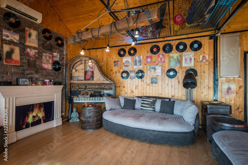Decorative wooden interior of living room , log cabin © poplasen