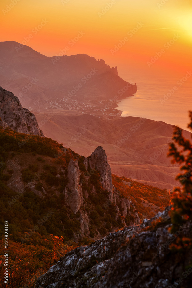 Sunset in the mountains on the sea coast