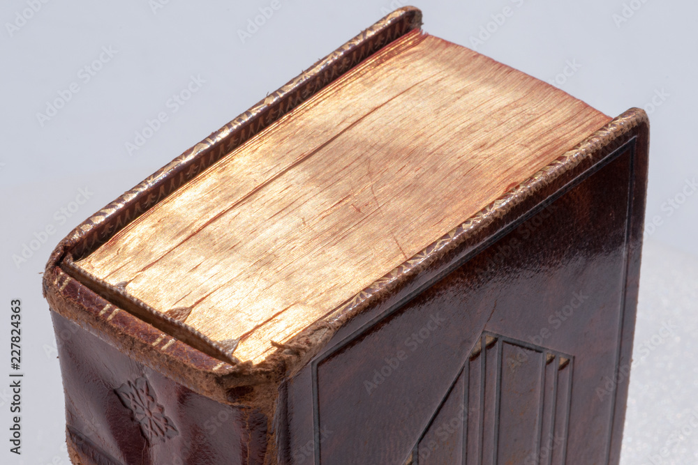 Obraz premium Gilt edges of old book covered with a thin layer of gold leaf